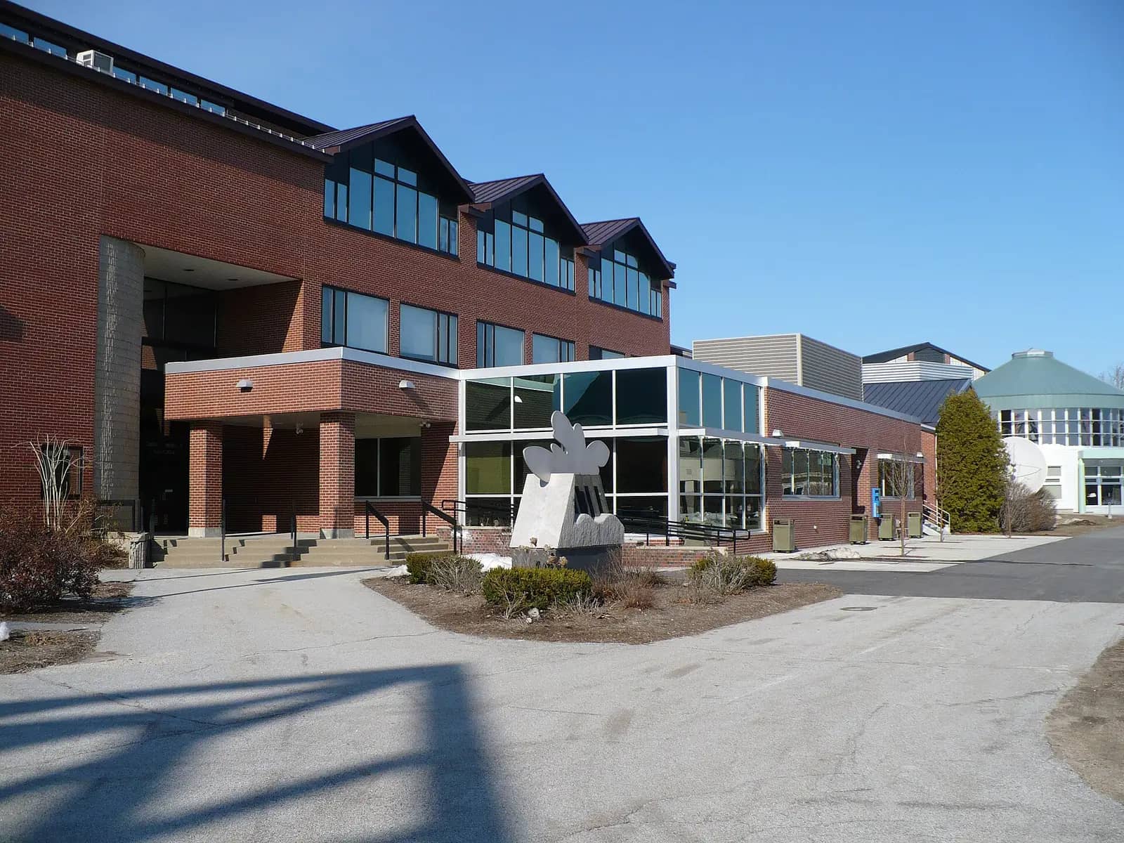 NHTI-Concord's Community College campus — NHTI's Sweeney Hall, with the Bistro below and the Student Center partly visible to the right.
